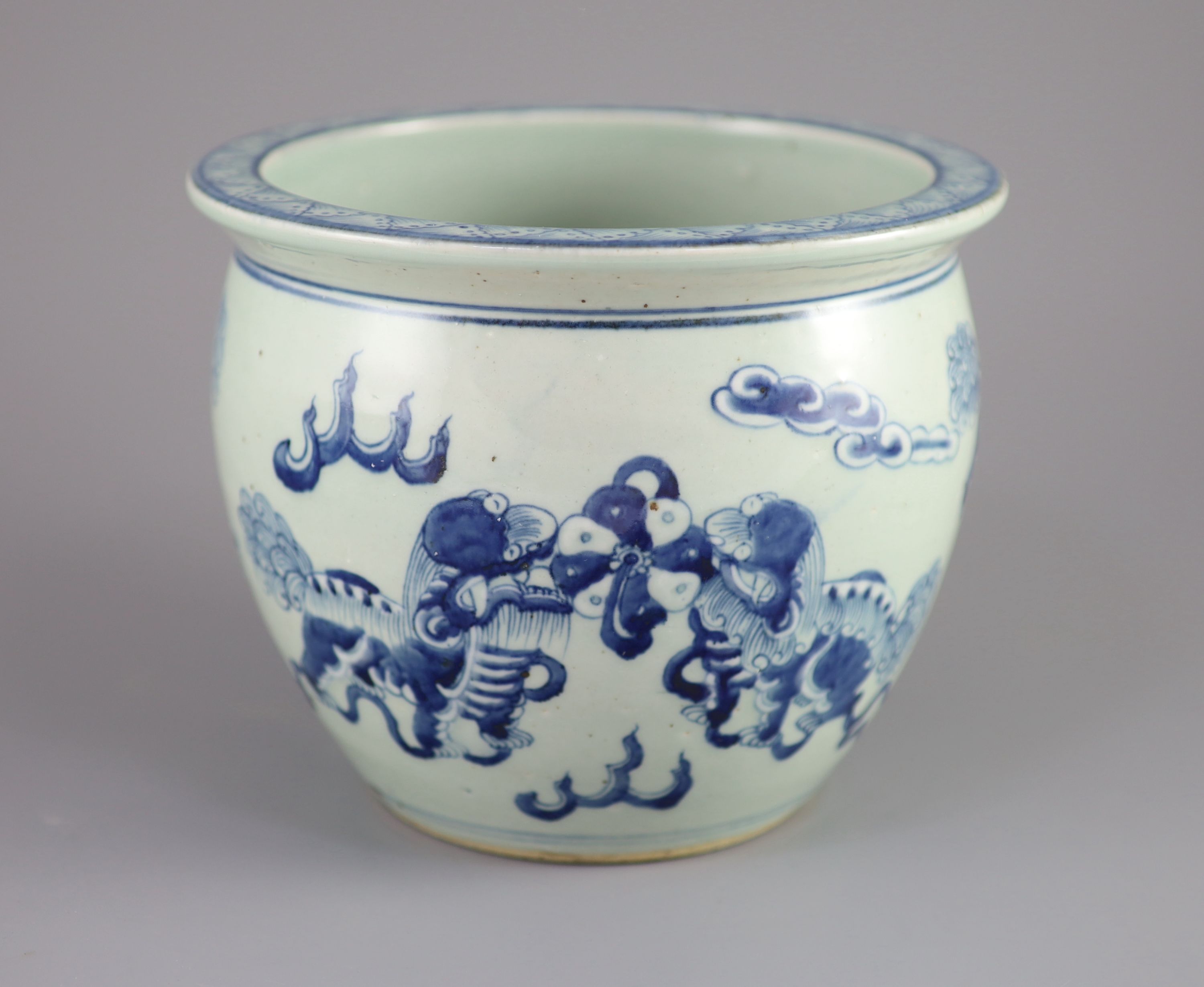 A Chinese blue and white 'lion-dog' flower pot, 20cm diameter
